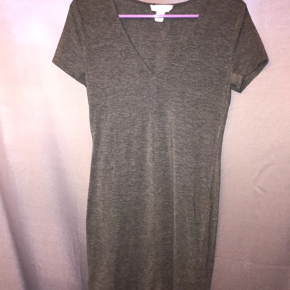 Mid length gray dress.